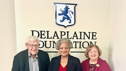 Delaplaine Foundation members present check to AARCH Society